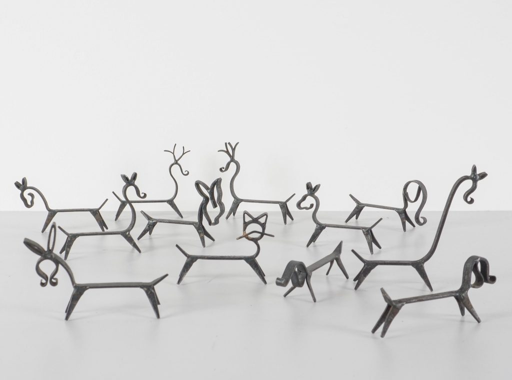 Suite de 12 porte-couteaux métal animaux